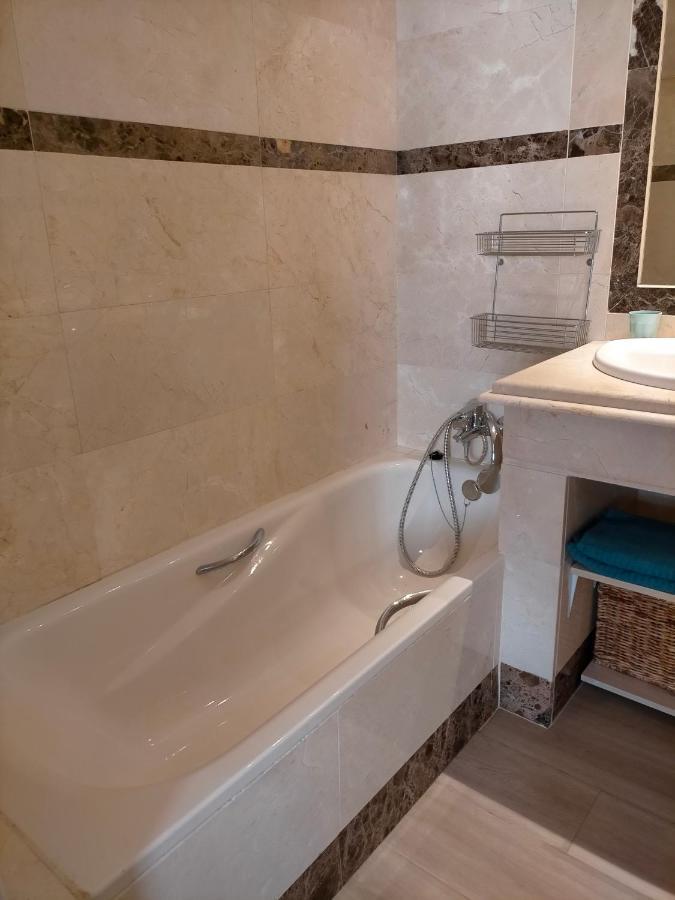 Appartement Met Zeezicht En Vlakbij Het Strand มานิลบา ภายนอก รูปภาพ